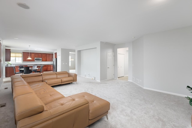 14605 Colonial Pkwy, Plainfield, IL 60544 - living area featuring light colored carpet and baseboards