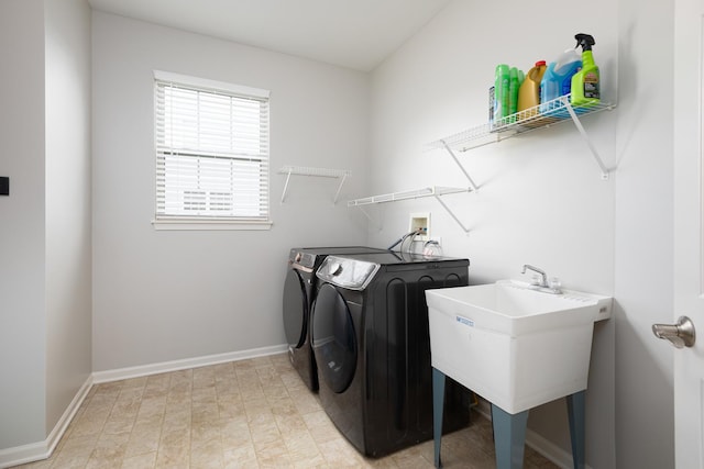 14605 Colonial Pkwy, Plainfield, IL 60544 - laundry area featuring separate washer and dryer and baseboards