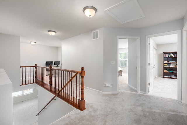 14605 Colonial Pkwy, Plainfield, IL 60544 - hallway featuring an upstairs landing, carpet, and baseboards