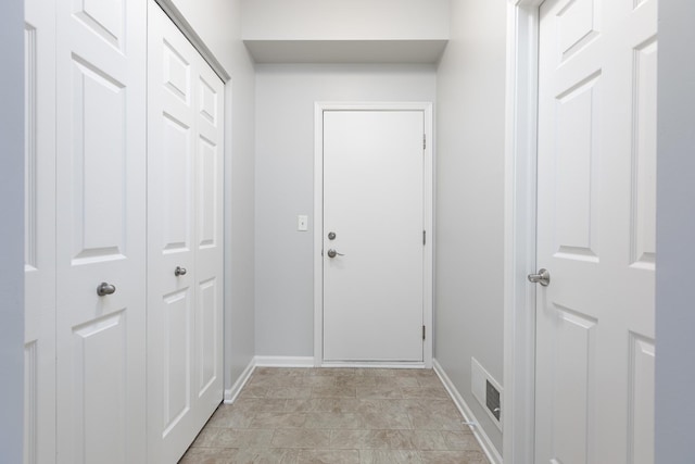 14605 Colonial Pkwy, Plainfield, IL 60544 - doorway to outside featuring baseboards
