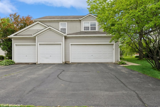 221 Wedgewood Cir, Lake In The Hills, IL 60156 - view of front of property with driveway and a garage