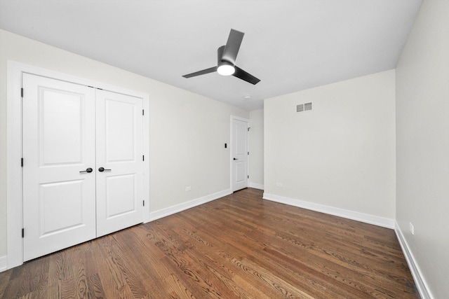 8300 S 79th Ct, Justice, IL 60458 - unfurnished bedroom with wood finished floors, baseboards, ceiling fan, and a closet