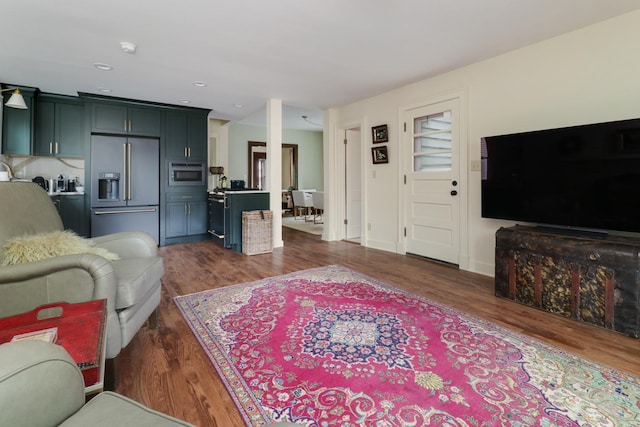 2013 E Taylor St, Bloomington, IL 61701 - living area with dark wood-style flooring
