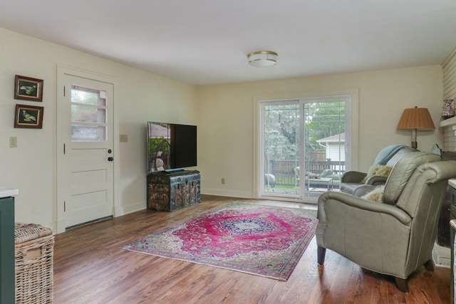 2013 E Taylor St, Bloomington, IL 61701 - living room featuring wood finished floors and baseboards