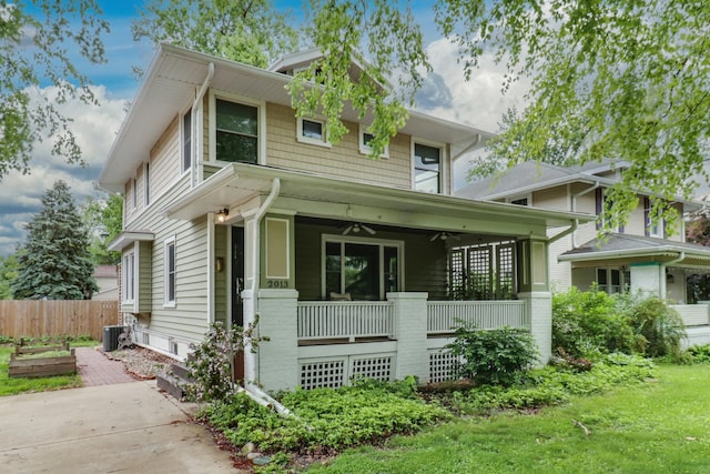 2013 E Taylor St, Bloomington, IL 61701 - traditional style home with a porch, ceiling fan, and central AC
