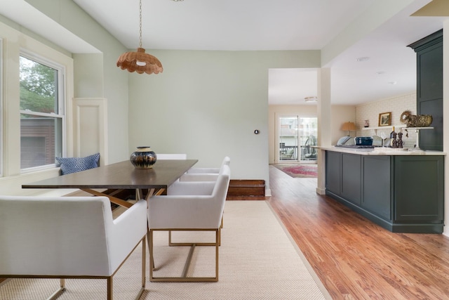 2013 E Taylor St, Bloomington, IL 61701 - dining space with plenty of natural light and light wood-type flooring