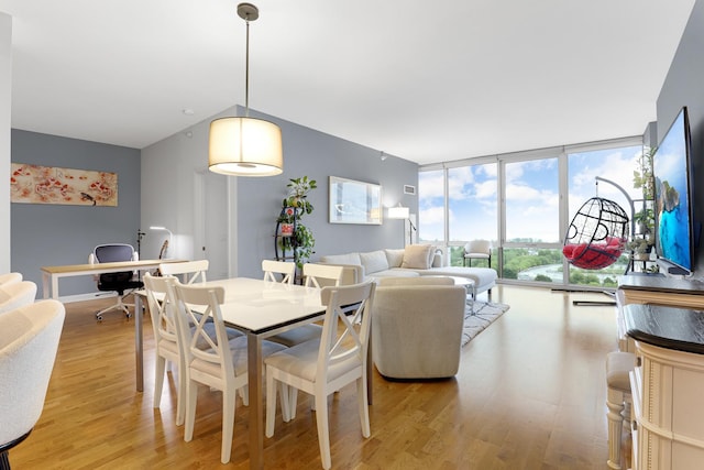 1629 S Prairie Ave Unit 1503, Chicago, IL 60616 - dining area with light wood-type flooring and expansive windows