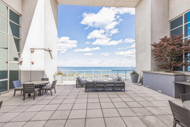 1629 S Prairie Ave Unit 1503, Chicago, IL 60616 - view of patio / terrace with a water view, outdoor dining area, and an outdoor hangout area