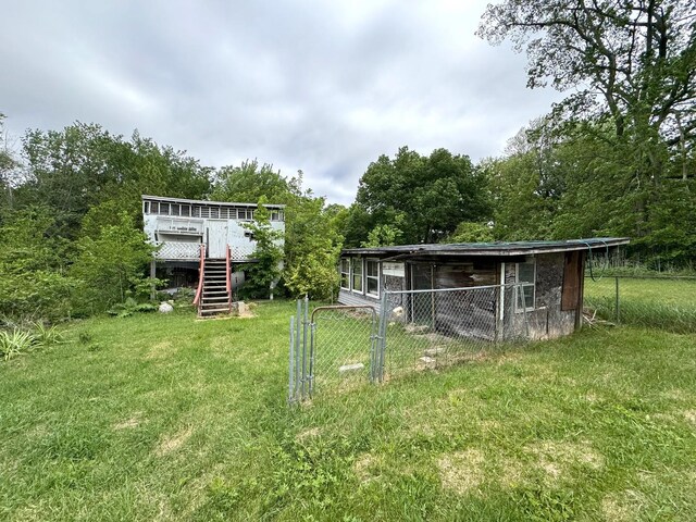 116 W 13th St, Kewanee, IL 61443 - view of yard with stairway and a deck