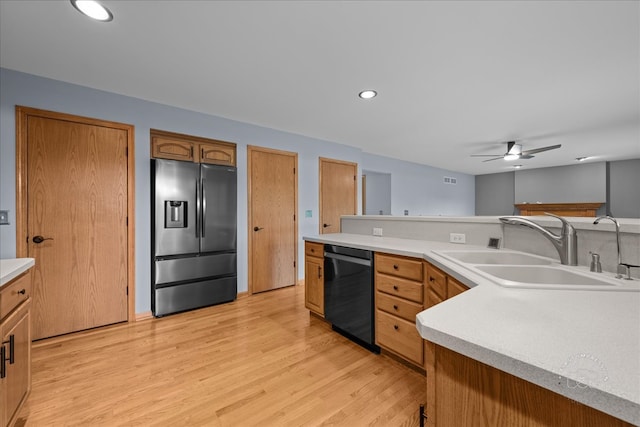 10N738 Prairie Xing, Elgin, IL 60124 - kitchen featuring stainless steel fridge with ice dispenser, dishwasher, a sink, a ceiling fan, and light wood-type flooring