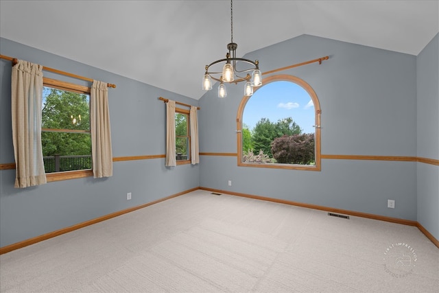 10N738 Prairie Xing, Elgin, IL 60124 - carpeted spare room with vaulted ceiling, a chandelier, and baseboards
