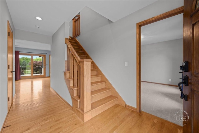 10N738 Prairie Xing, Elgin, IL 60124 - staircase with baseboards, wood finished floors, and recessed lighting