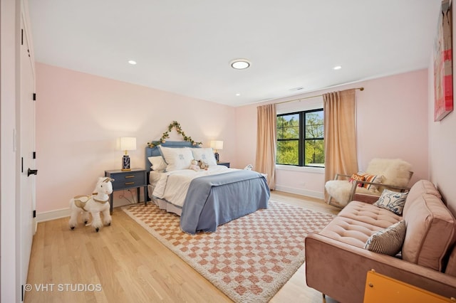 490 S Waukegan Rd, Lake Forest, IL 60045 - bedroom with light wood-style floors, baseboards, and recessed lighting