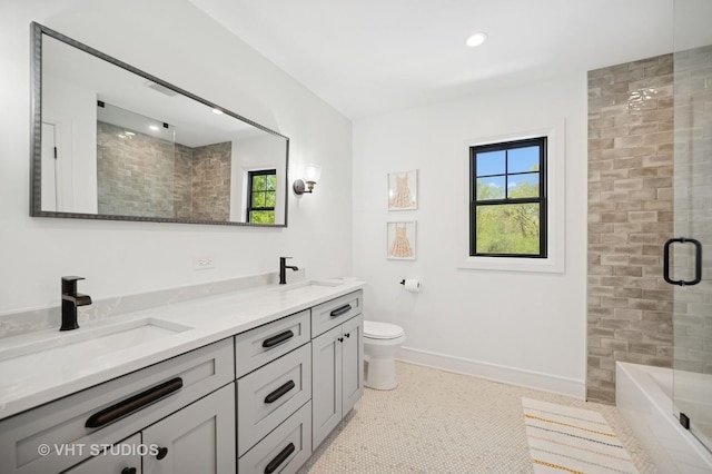490 S Waukegan Rd, Lake Forest, IL 60045 - full bath with double vanity, toilet, and baseboards