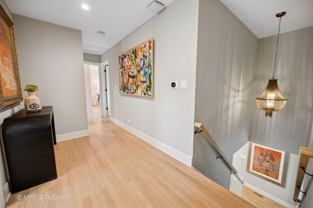 490 S Waukegan Rd, Lake Forest, IL 60045 - hall featuring an upstairs landing, light wood-style flooring, baseboards, and recessed lighting