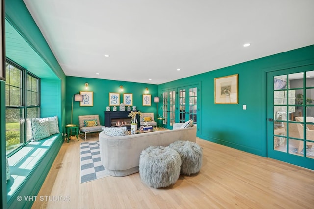 490 S Waukegan Rd, Lake Forest, IL 60045 - living area with wood finished floors, recessed lighting, and a warm lit fireplace
