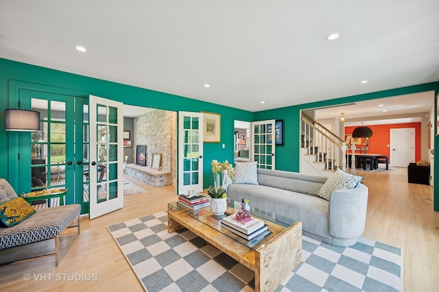 490 S Waukegan Rd, Lake Forest, IL 60045 - living room with french doors, stairway, wood finished floors, and recessed lighting