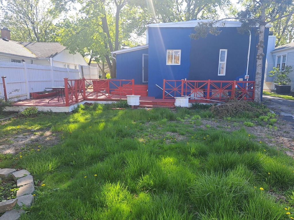 933 Mason Ln, Des Plaines, IL 60016 - back of house featuring a wooden deck and cooling unit