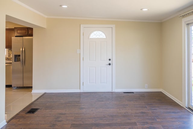 2702 N 76th Ave, Elmwood Park, IL 60707 - entrance foyer featuring wood finished floors, ornamental molding, baseboards, and recessed lighting