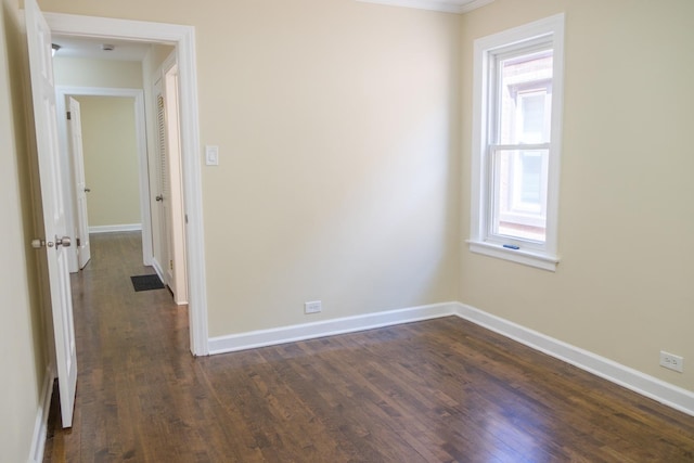 2702 N 76th Ave, Elmwood Park, IL 60707 - unfurnished room featuring dark wood-style floors and baseboards