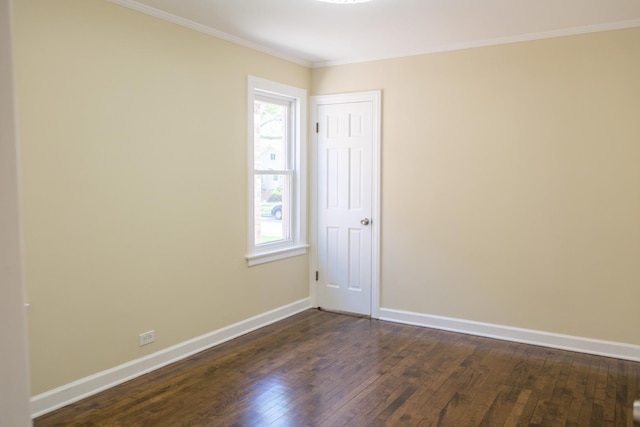 2702 N 76th Ave, Elmwood Park, IL 60707 - unfurnished room featuring dark wood finished floors, baseboards, and crown molding
