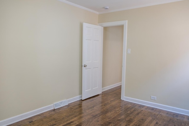 2702 N 76th Ave, Elmwood Park, IL 60707 - unfurnished room with baseboards, crown molding, dark wood-style floors, and a smoke detector
