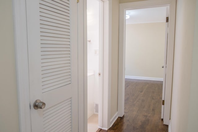 2702 N 76th Ave, Elmwood Park, IL 60707 - corridor with dark wood-style floors and baseboards