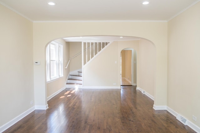 2702 N 76th Ave, Elmwood Park, IL 60707 - unfurnished room featuring arched walkways, wood finished floors, ornamental molding, recessed lighting, and baseboards