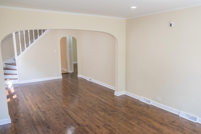 2702 N 76th Ave, Elmwood Park, IL 60707 - spare room with arched walkways, dark wood-style flooring, baseboards, crown molding, and recessed lighting
