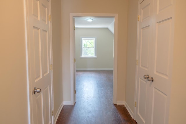 2702 N 76th Ave, Elmwood Park, IL 60707 - hall featuring dark wood-type flooring, baseboards, and vaulted ceiling