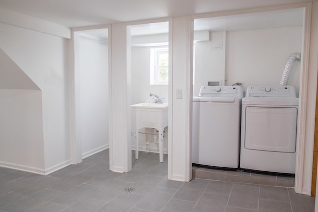 2702 N 76th Ave, Elmwood Park, IL 60707 - laundry room featuring washing machine and clothes dryer and tile patterned floors