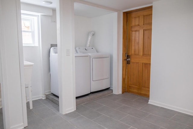 2702 N 76th Ave, Elmwood Park, IL 60707 - washroom featuring separate washer and dryer, tile patterned floors, and baseboards