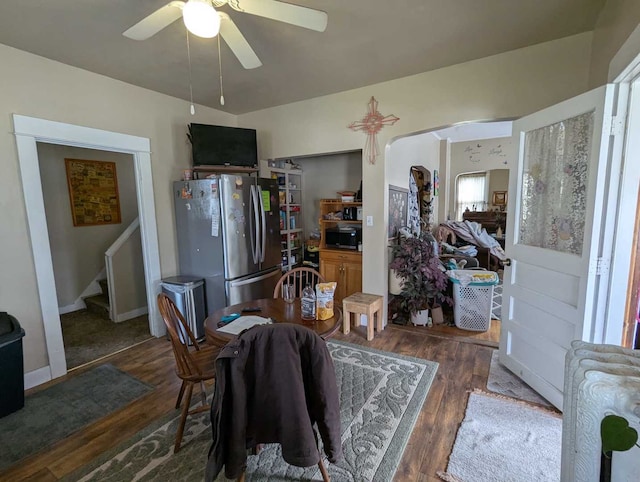 1215 3rd St, Moline, IL 61265 - dining room with wood finished floors, a ceiling fan, and stairs