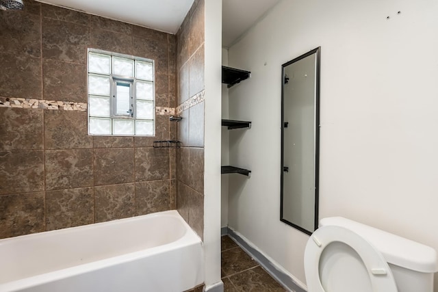 3924 W Greenleaf Ave, Lincolnwood, IL 60712 - full bath with toilet, tile patterned floors, washtub / shower combination, and baseboards