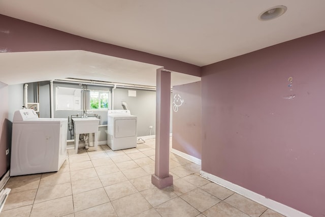 3924 W Greenleaf Ave, Lincolnwood, IL 60712 - washroom with independent washer and dryer, light tile patterned floors, and baseboards