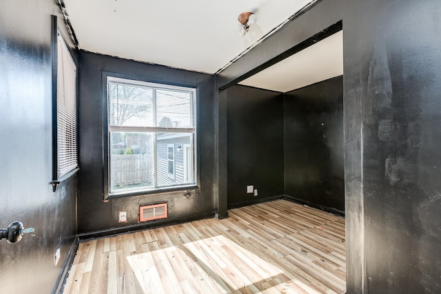 3924 W Greenleaf Ave, Lincolnwood, IL 60712 - unfurnished room featuring wood finished floors