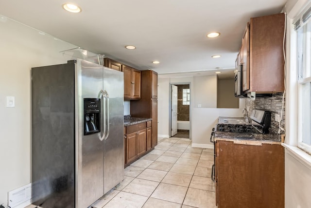3924 W Greenleaf Ave, Lincolnwood, IL 60712 - kitchen with stainless steel appliances, healthy amount of natural light, backsplash, and recessed lighting