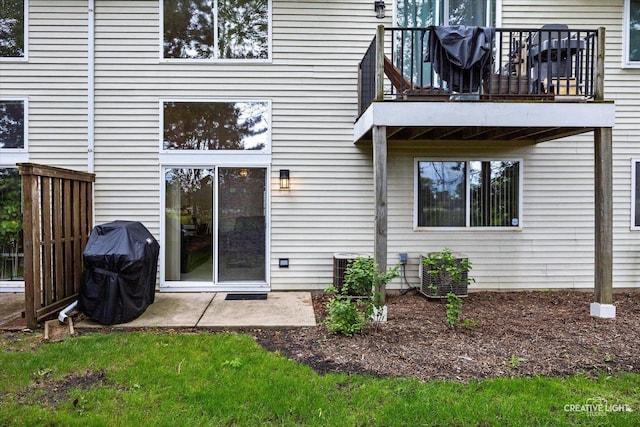 937 Huntington Dr, Elk Grove Village, IL 60007 - back of house featuring a balcony and central air condition unit