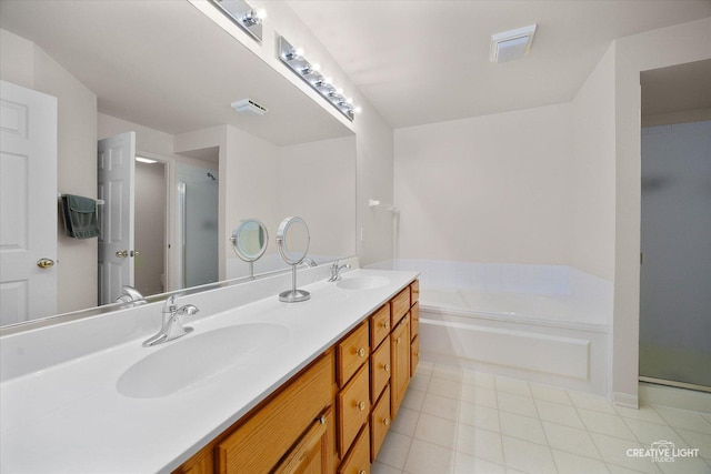 937 Huntington Dr, Elk Grove Village, IL 60007 - bathroom with a shower stall, a garden tub, double vanity, and tile patterned flooring