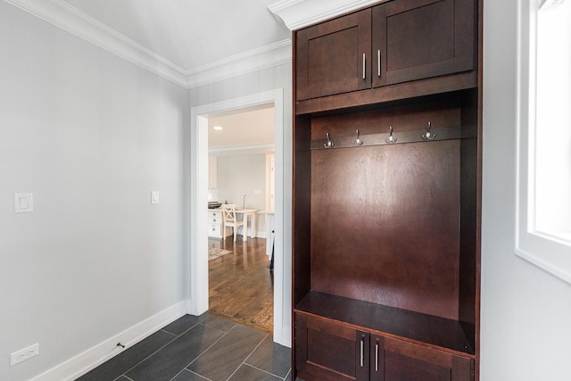 732 S Mitchell Ave, Elmhurst, IL 60126 - mudroom with ornamental molding, baseboards, and dark tile patterned floors
