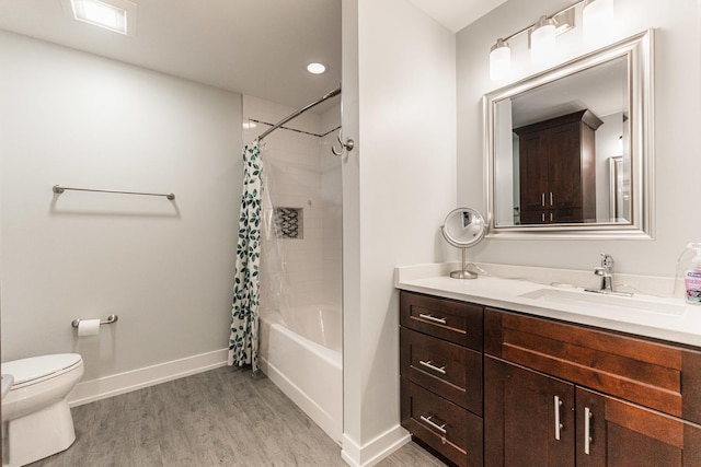 732 S Mitchell Ave, Elmhurst, IL 60126 - bathroom featuring toilet, vanity, wood finished floors, baseboards, and shower / bath combination with curtain