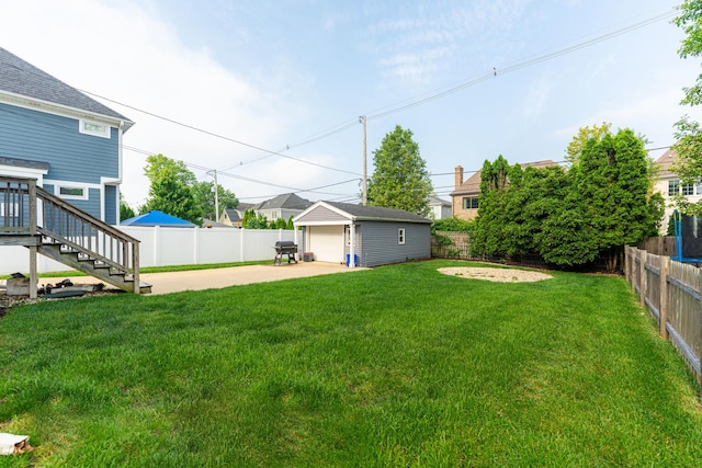 732 S Mitchell Ave, Elmhurst, IL 60126 - view of yard with an outbuilding, a detached garage, and stairway