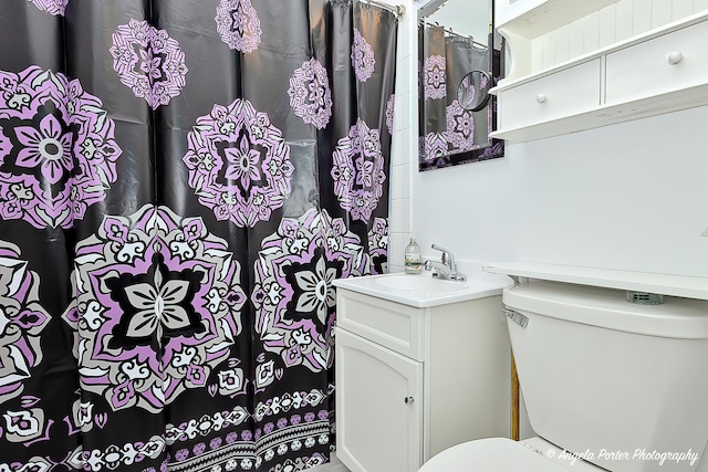 5704 N Woodland Dr, Mchenry, IL 60050 - full bath featuring toilet, vanity, and a shower with curtain