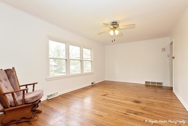 5704 N Woodland Dr, Mchenry, IL 60050 - unfurnished room with crown molding, ceiling fan, light wood-type flooring, and baseboards