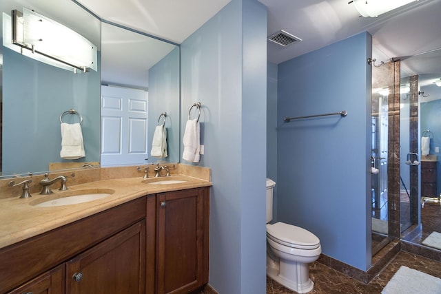 25 E Superior St Unit 2805, Chicago, IL 60611 - bathroom featuring marble look tiles, a stall shower, double vanity, toilet, and baseboards
