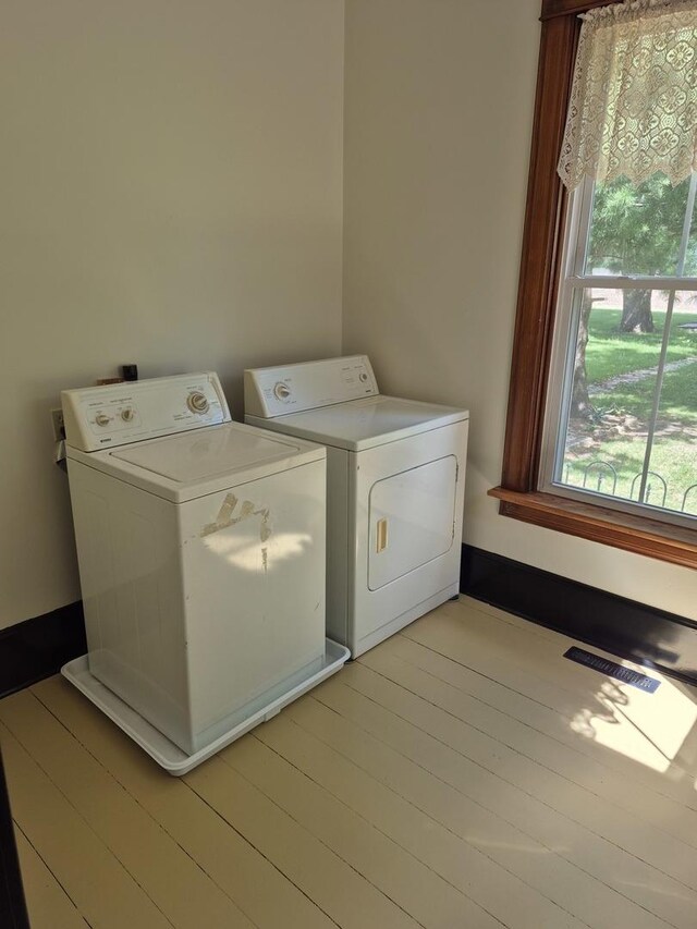 123 W Maple St, Franklin Grove, IL 61031 - washroom with independent washer and dryer and light wood-style flooring