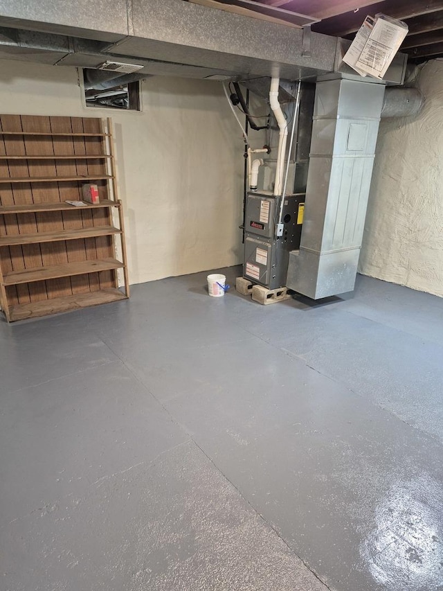 123 W Maple St, Franklin Grove, IL 61031 - unfinished basement featuring heating unit