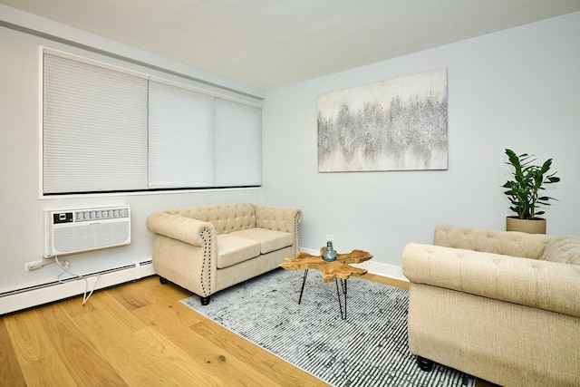 6300 N Sheridan Rd Unit 112, Chicago, IL 60660 - living room with light wood-type flooring, a wall mounted air conditioner, a baseboard radiator, and baseboards