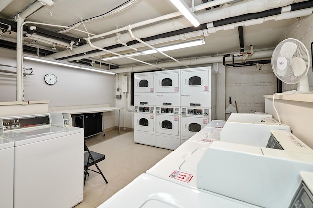 6300 N Sheridan Rd Unit 112, Chicago, IL 60660 - shared laundry with stacked washer / drying machine, separate washer and dryer, and light tile patterned floors