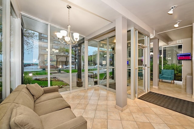 6300 N Sheridan Rd Unit 112, Chicago, IL 60660 - sunroom / solarium featuring a chandelier